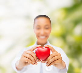 Image showing woman hands with red heart
