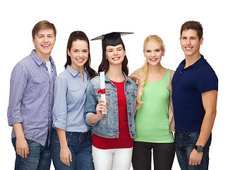 Image showing group of standing smiling students with diploma