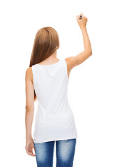 Image showing girl in blank white shirt drawing something