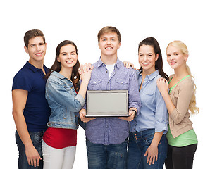 Image showing smiling students with laptop computer