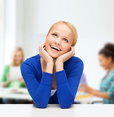 Image showing happy woman dreaming and laughing