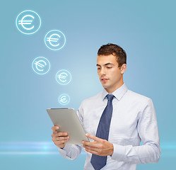 Image showing buisnessman with tablet pc and euro icons