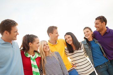 Image showing group of friends having fun on the beach