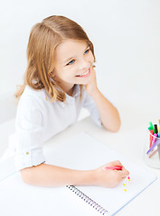 Image showing little student girl drawing at school