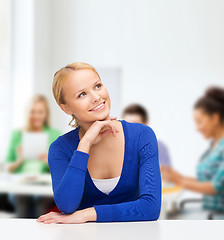 Image showing happy woman dreaming