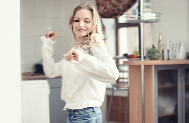 Image showing Dancing at the kitchen