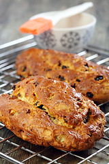 Image showing Christmas stollen on the metal lattice.