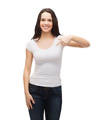 Image showing smiling teenager in blank white t-shirt