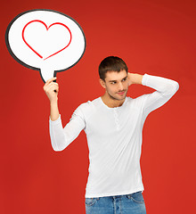 Image showing pensive man with text bubble and heart in it