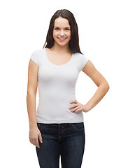 Image showing smiling teenager in blank white t-shirt