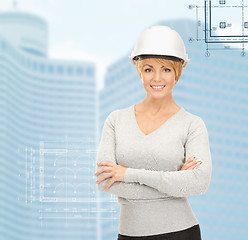 Image showing female contractor in helmet