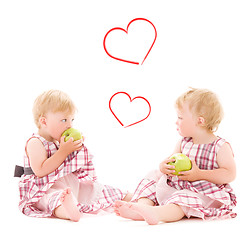 Image showing two adorable twins over white