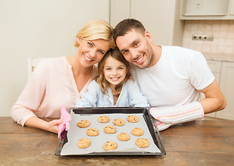 Image showing happy family making cookies at home