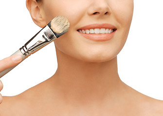 Image showing beautiful woman with brush