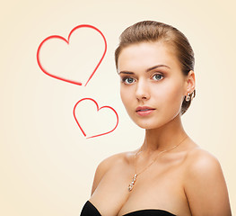 Image showing charming woman wearing shiny diamond earrings