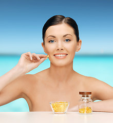 Image showing beautiful woman with omega 3 vitamins