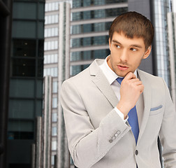 Image showing pensive businessman