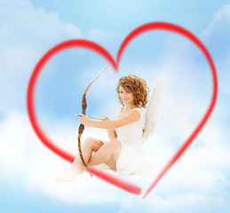 Image showing happy teenage angel girl with bow and arrow