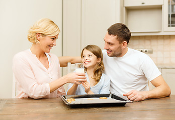 Image showing happy family making cookies at home