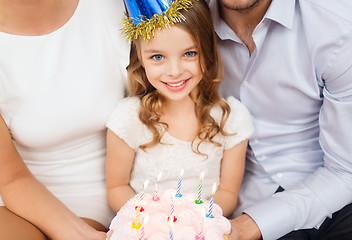 Image showing family with cake and candles