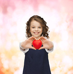 Image showing beautiful girl with small heart