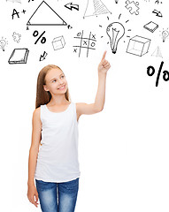 Image showing girl in white shirt pointing to idea