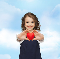 Image showing beautiful girl with small heart