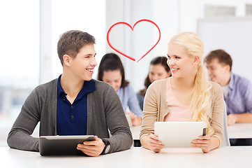 Image showing students looking at tablet pc in lecture at school