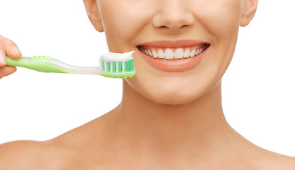 Image showing woman with toothbrush