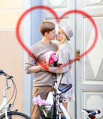 Image showing couple with bicycles in the city