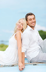 Image showing smiling couple at sea side