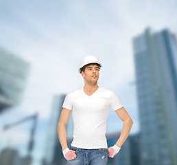 Image showing handsome builder in white helmet