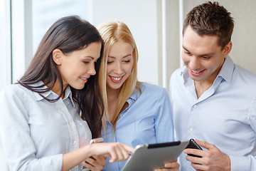 Image showing business team working with tablet pcs in office