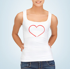 Image showing woman in white tank top with heart on it