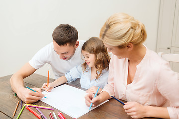 Image showing happy family drawing at home