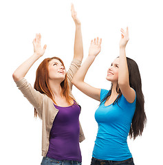 Image showing two happy dancing girls