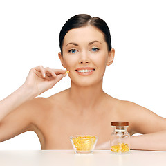 Image showing beautiful woman with omega 3 vitamins