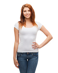 Image showing smiling teenager in blank white t-shirt