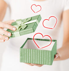 Image showing woman hands with gift box