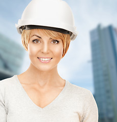 Image showing female contractor in helmet