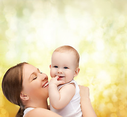 Image showing happy mother with adorable baby