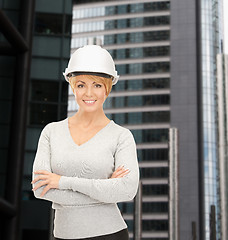 Image showing female contractor in helmet