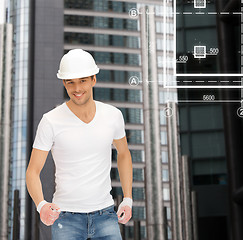 Image showing handsome builder in white helmet