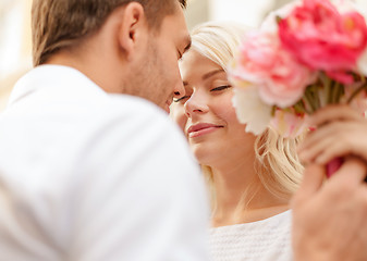 Image showing couple with flowers in the city