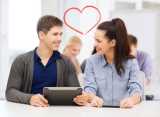 Image showing students looking at tablet pc in lecture at school