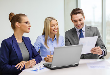 Image showing business team with laptop having discussion