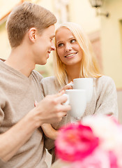 Image showing romantic happy couple in the cafe