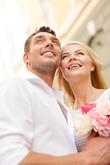 Image showing couple with flowers in the city