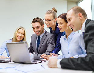 Image showing business team with laptop having discussion