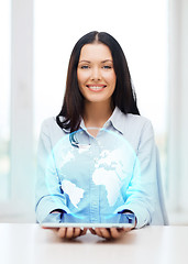 Image showing businesswoman with tablet pc comuter and globe
